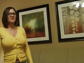Sexy babe with yellow button-up shirt and glasses gets fucked