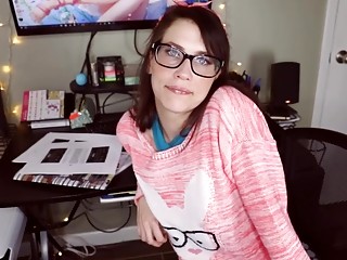 Cute camgirl sucks on a dildo before riding