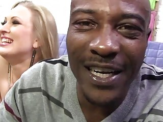 Two black dudes fuck a busty MILF in hardcore fashion